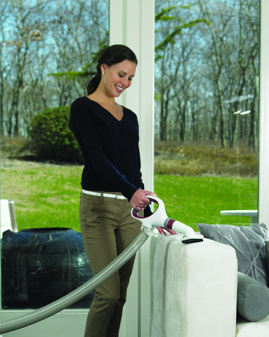 Shark NV501 upright with pod transition enabling portable cleaning on stairs and upholstery.