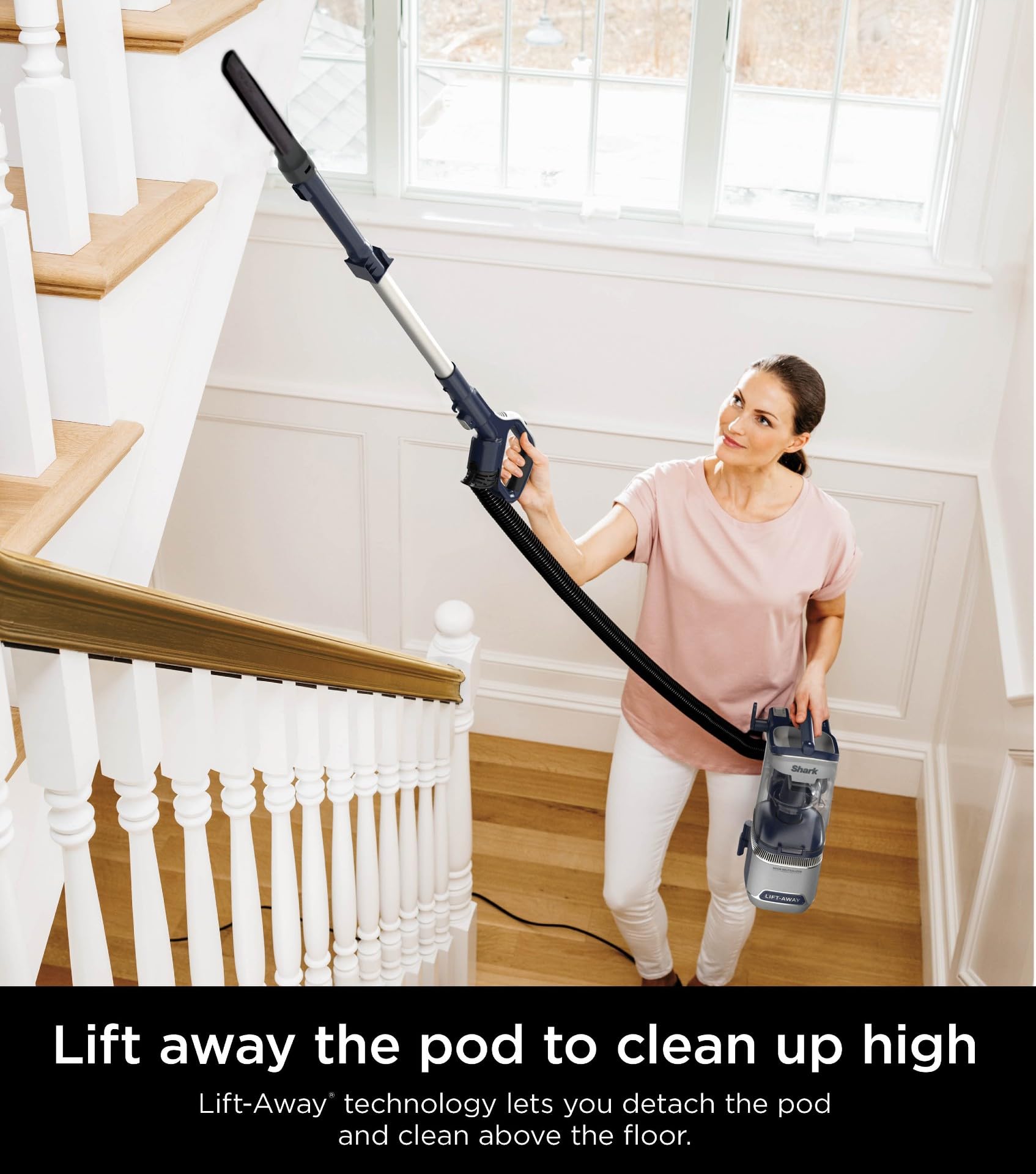 Shark Pet Performance Plus Lift-Away swivels smoothly around furniture.