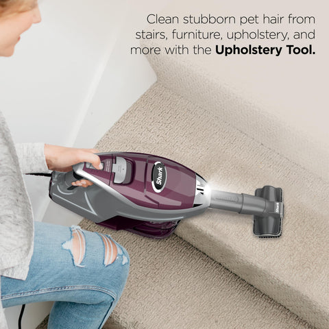 Shark Rocket Pet Plus LED nozzle revealing hidden dust under cabinets and corners