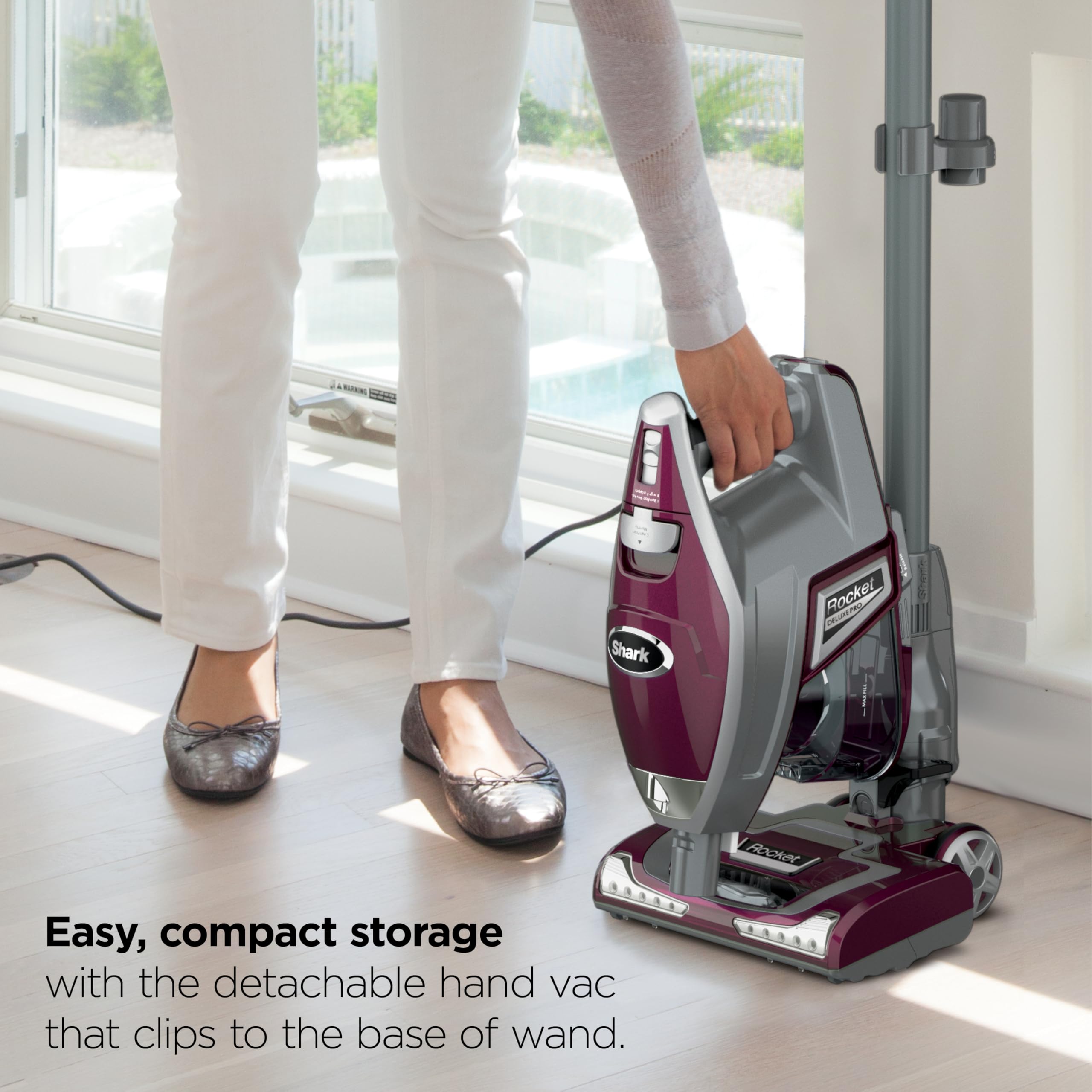 Shark Rocket Pet Plus Pet Multi-Tool lifting embedded hair on upholstery and stairs
