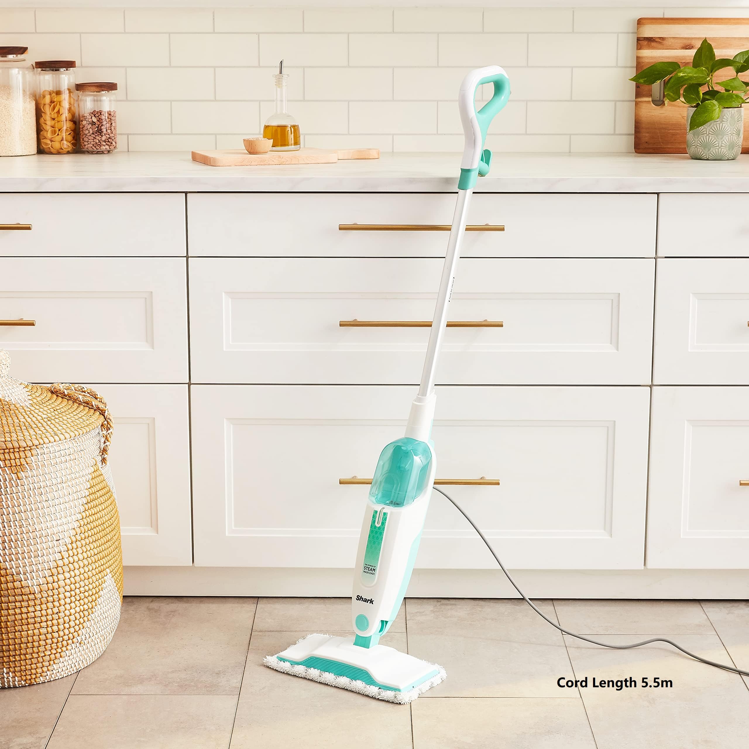 Shark S1000 swivel head cleans tight corners and around furniture.
