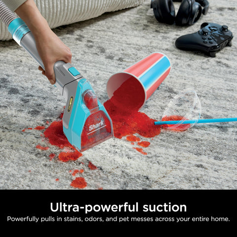 Shark StainStriker HairPro on-board self-cleaning feature in action