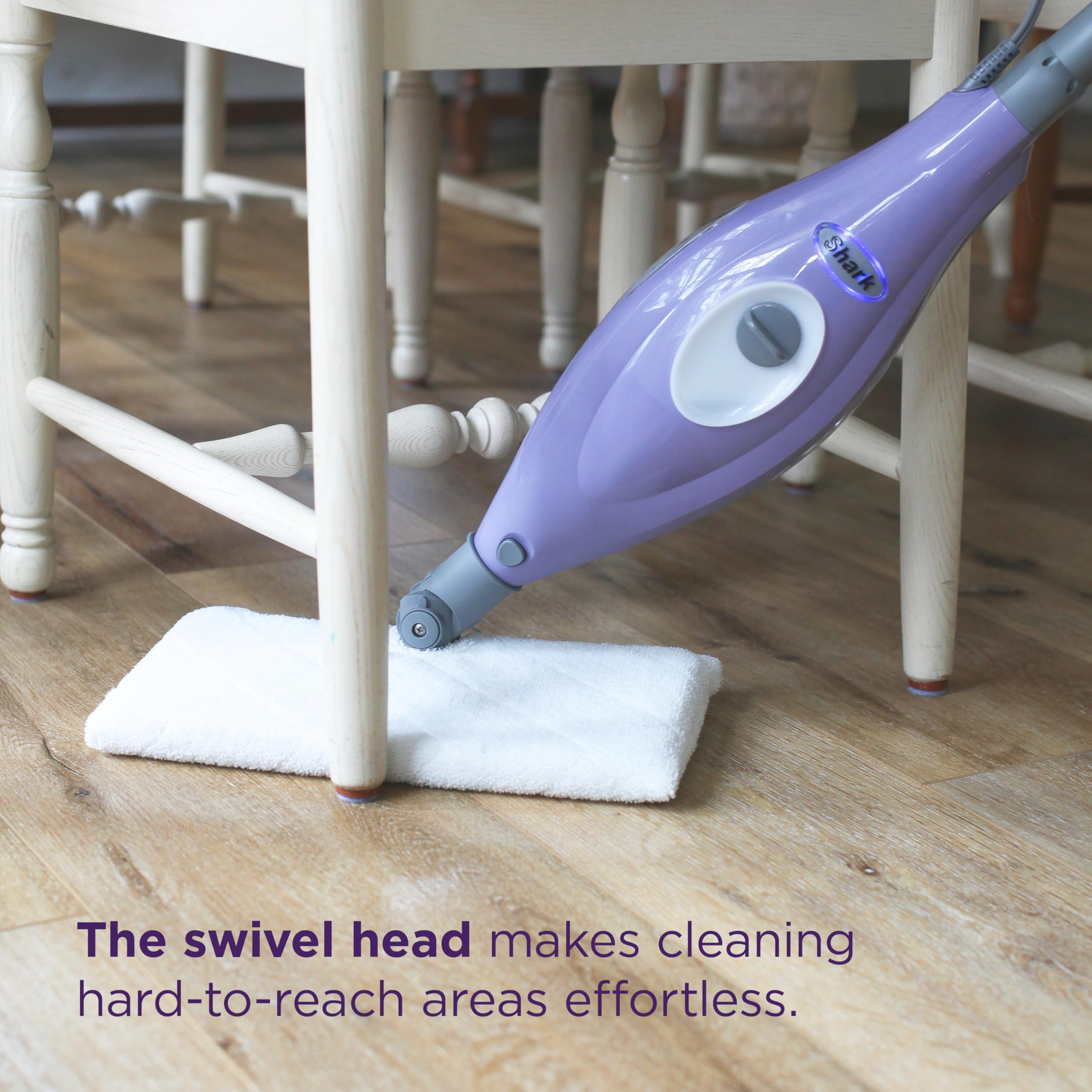 Shark Steam Pocket Mop S3501 reaching into corners around furniture.