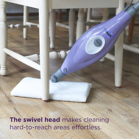 Shark Steam Pocket Mop S3501 reaching into corners around furniture.