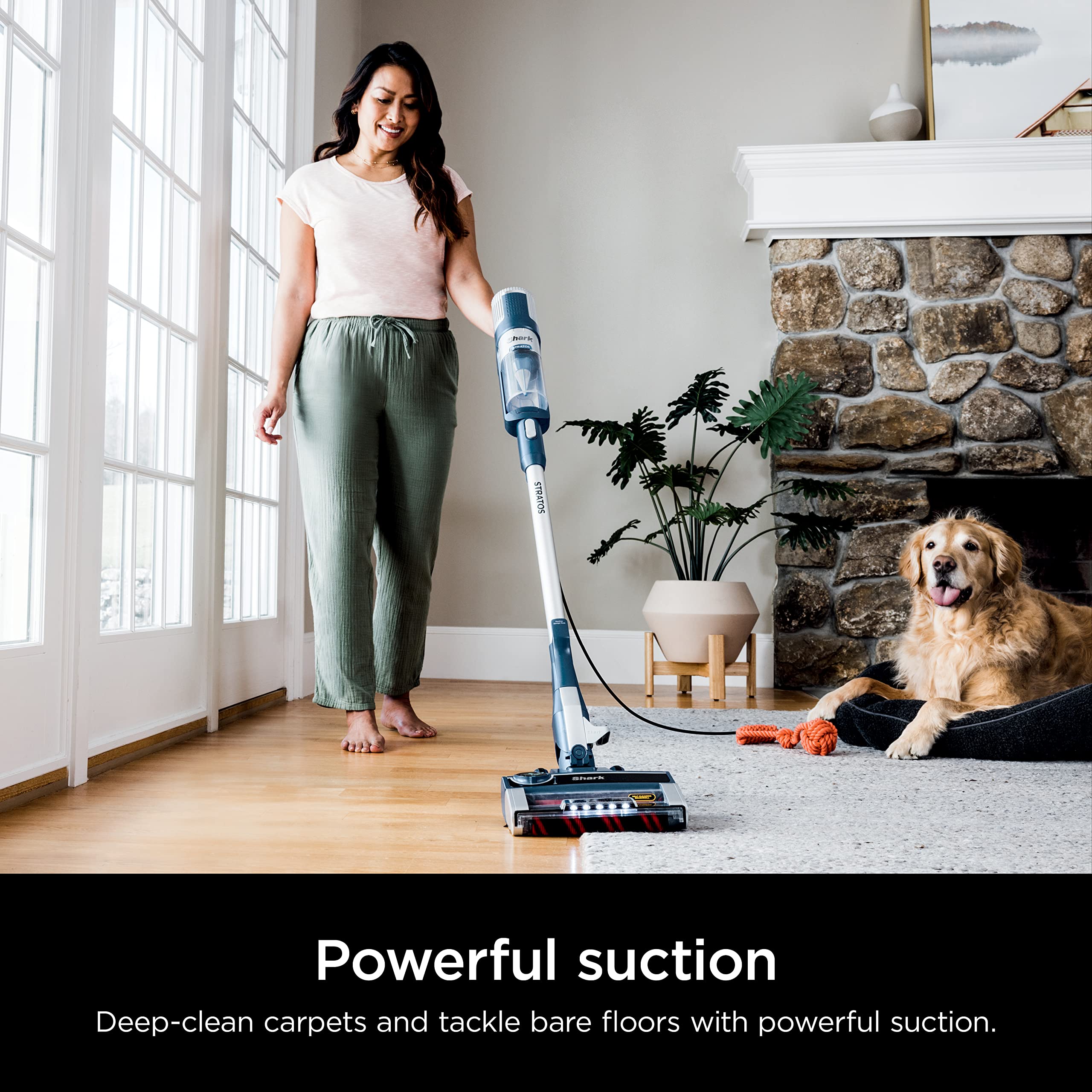 Shark Stratos DuoClean PowerFins in use on carpet and hard floor transition.
