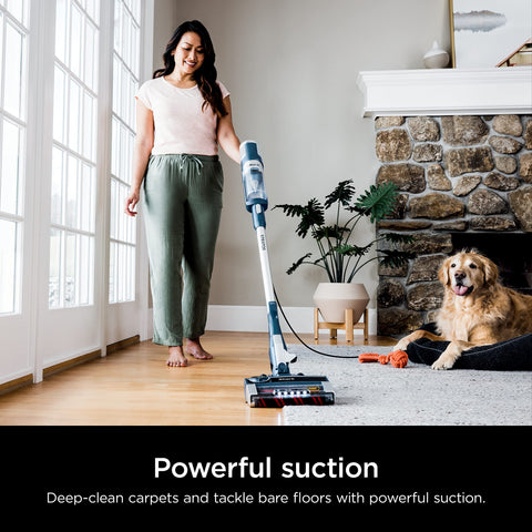Shark Stratos DuoClean PowerFins in use on carpet and hard floor transition.