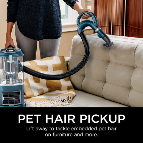 Shark pet crevice tool reaches tight corners for hair removal.