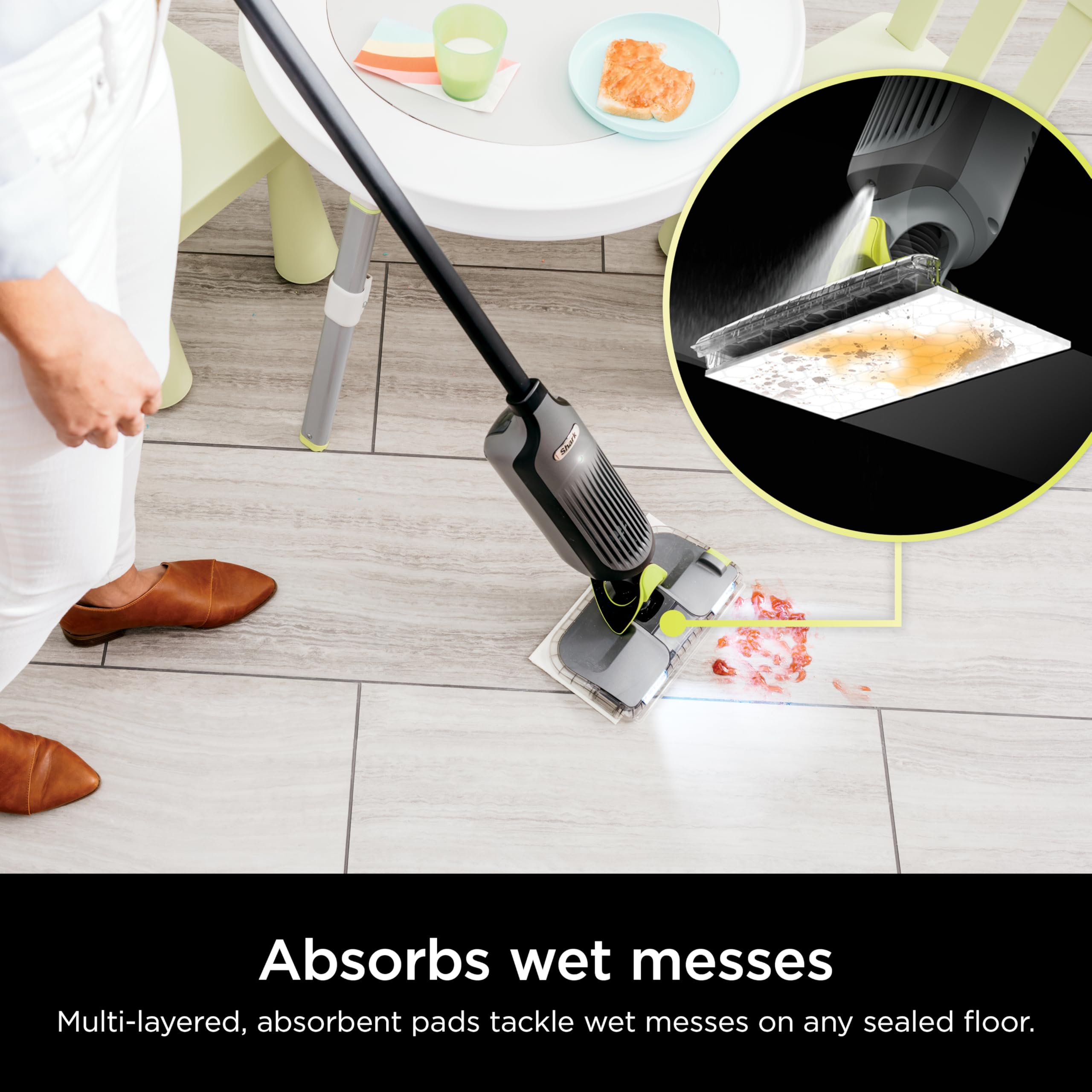 Shark VACMOP built-in dirt chamber trapping debris in pads
