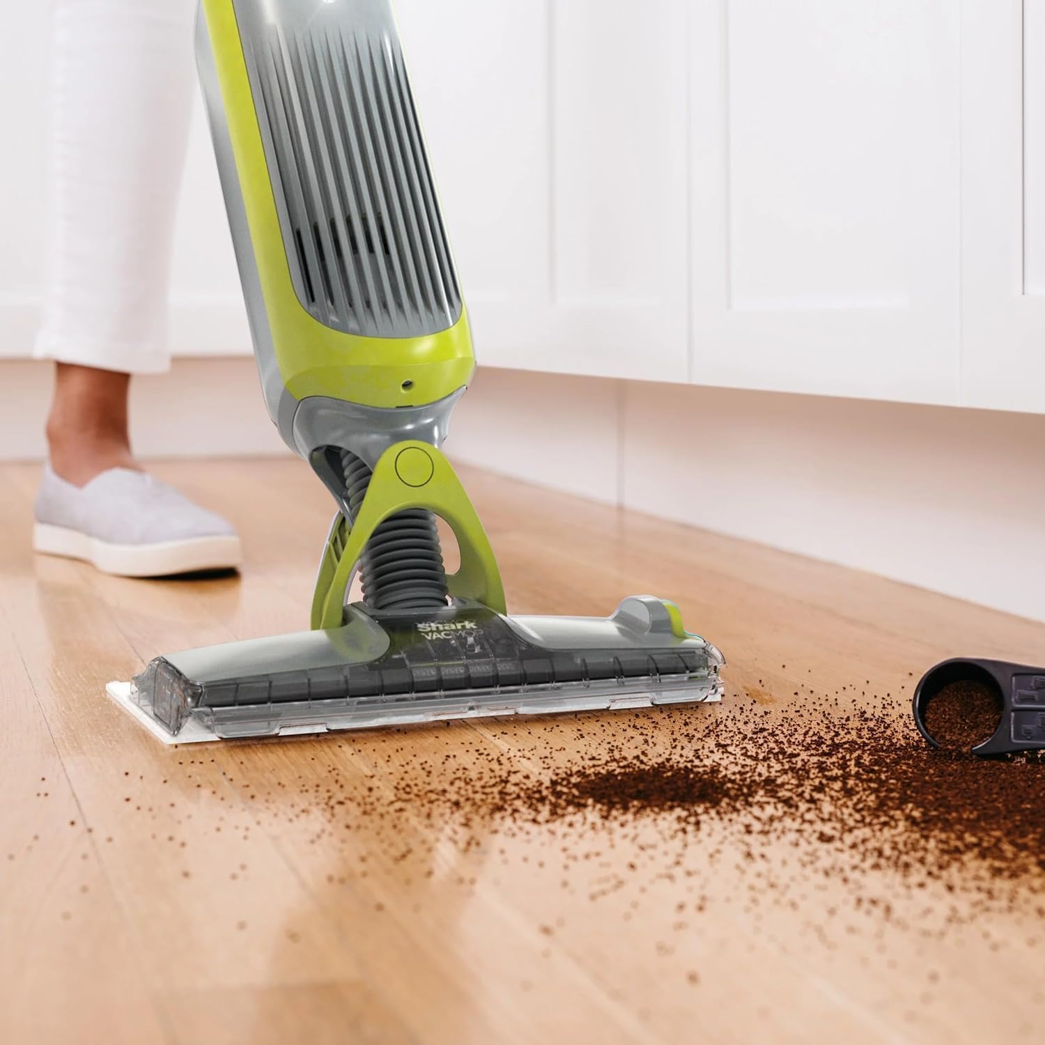 Shark VACMOP cleaning solution included for effective spot cleaning.