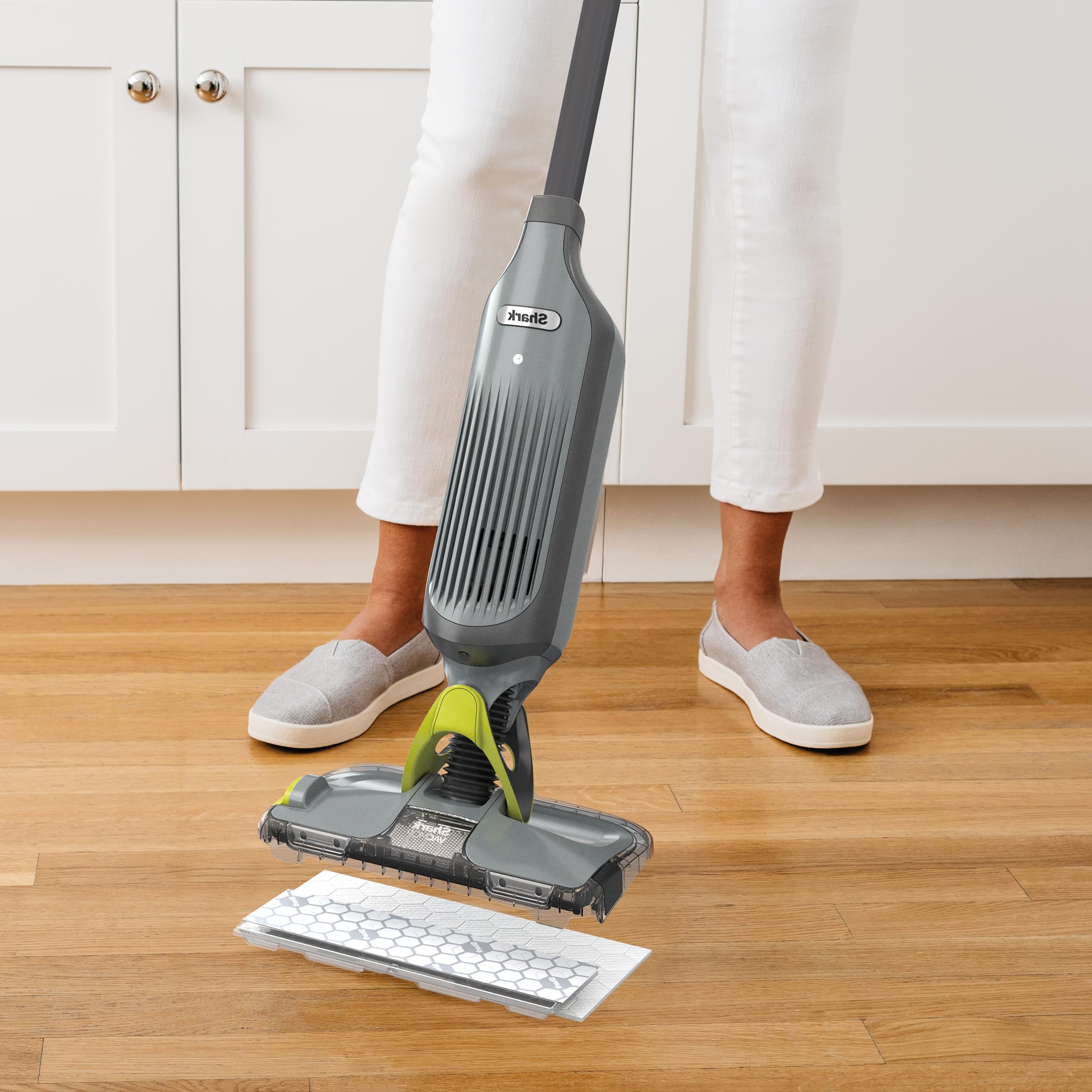 Shark VACMOP with LED headlights illuminating dark corners during cleaning