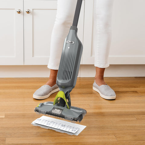 Shark VACMOP with LED headlights illuminating dark corners during cleaning