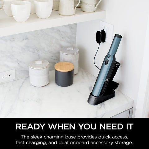 Shark WANDVAC lightweight handheld in use for quick cleanups