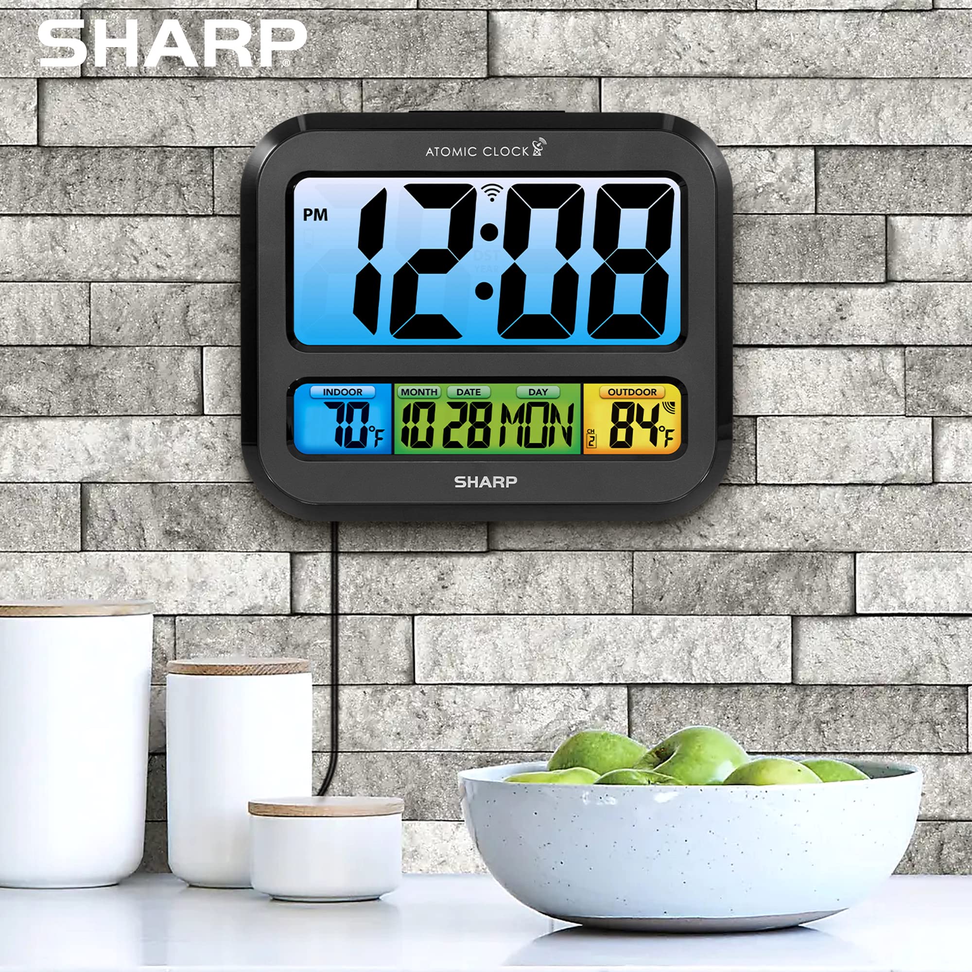 Sharp Atomic Clock shows indoor and outdoor temperature for quick context.