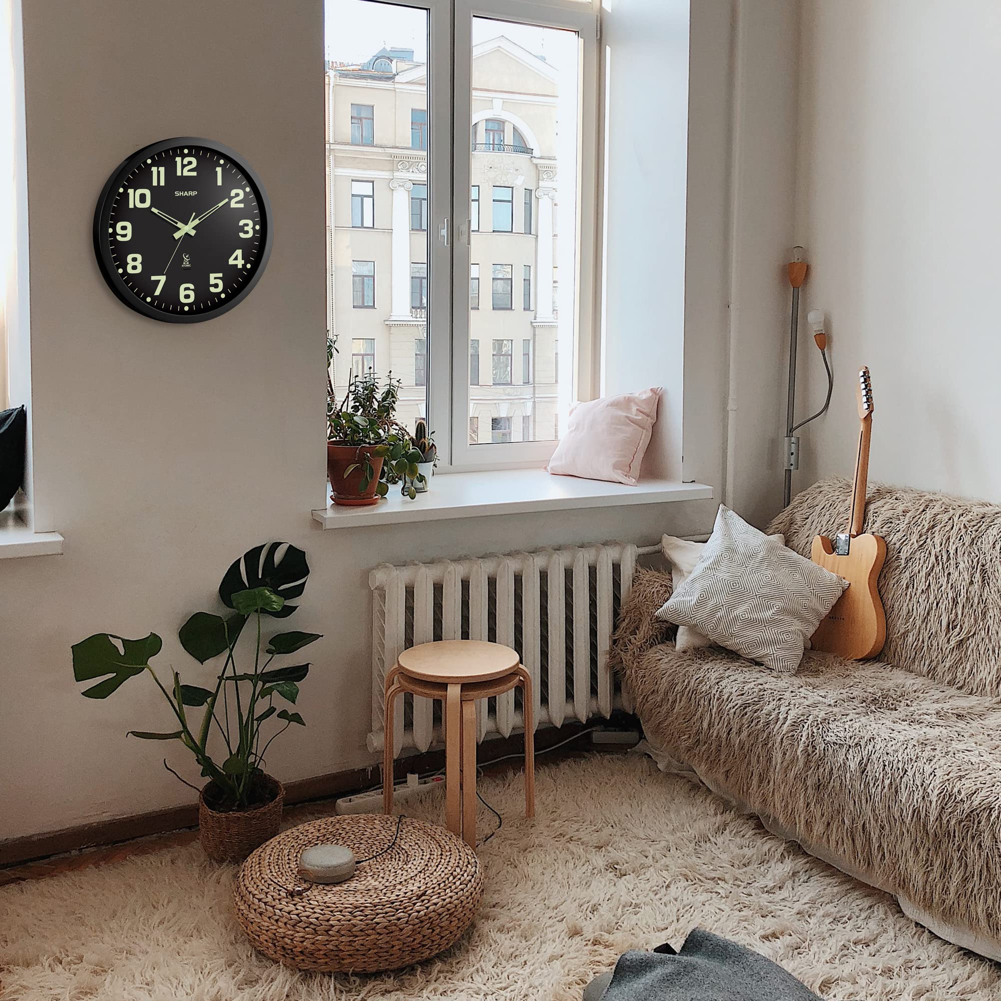 Sharp clock showcases versatile use in home, office, or kitchen decor