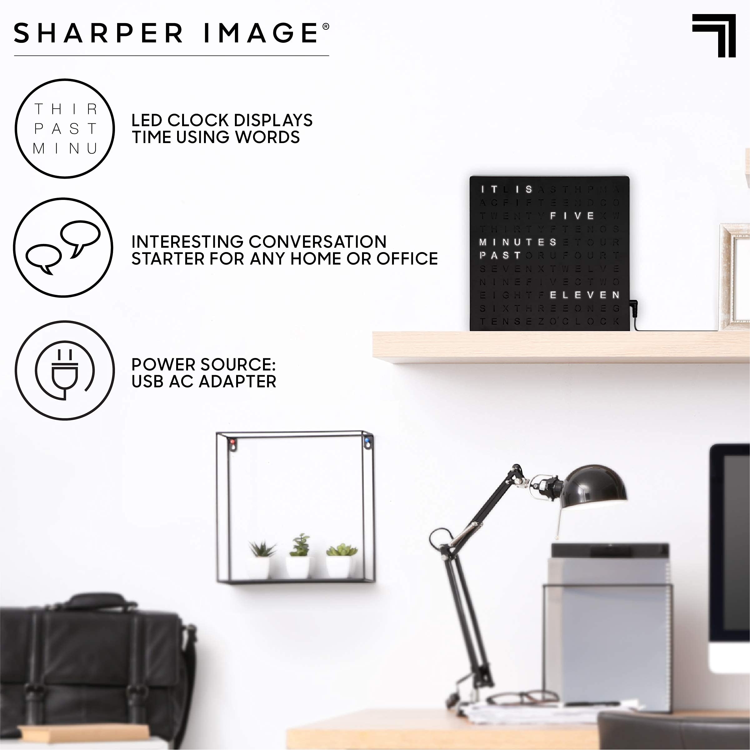 Sharper Image LED Word Clock in a sleek black finish complements contemporary decor.