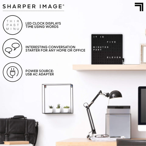 Sharper Image LED Word Clock in a sleek black finish complements contemporary decor.