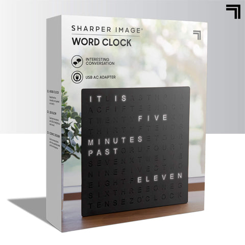 Sharper Image LED Word Clock serves as a unique conversation starter on a shelf.