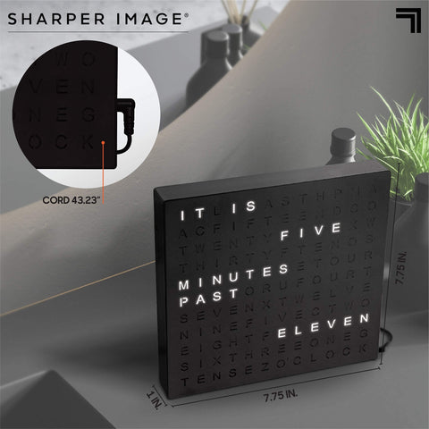 Sharper Image LED Word Clock shows time in five-minute increments at a glance.