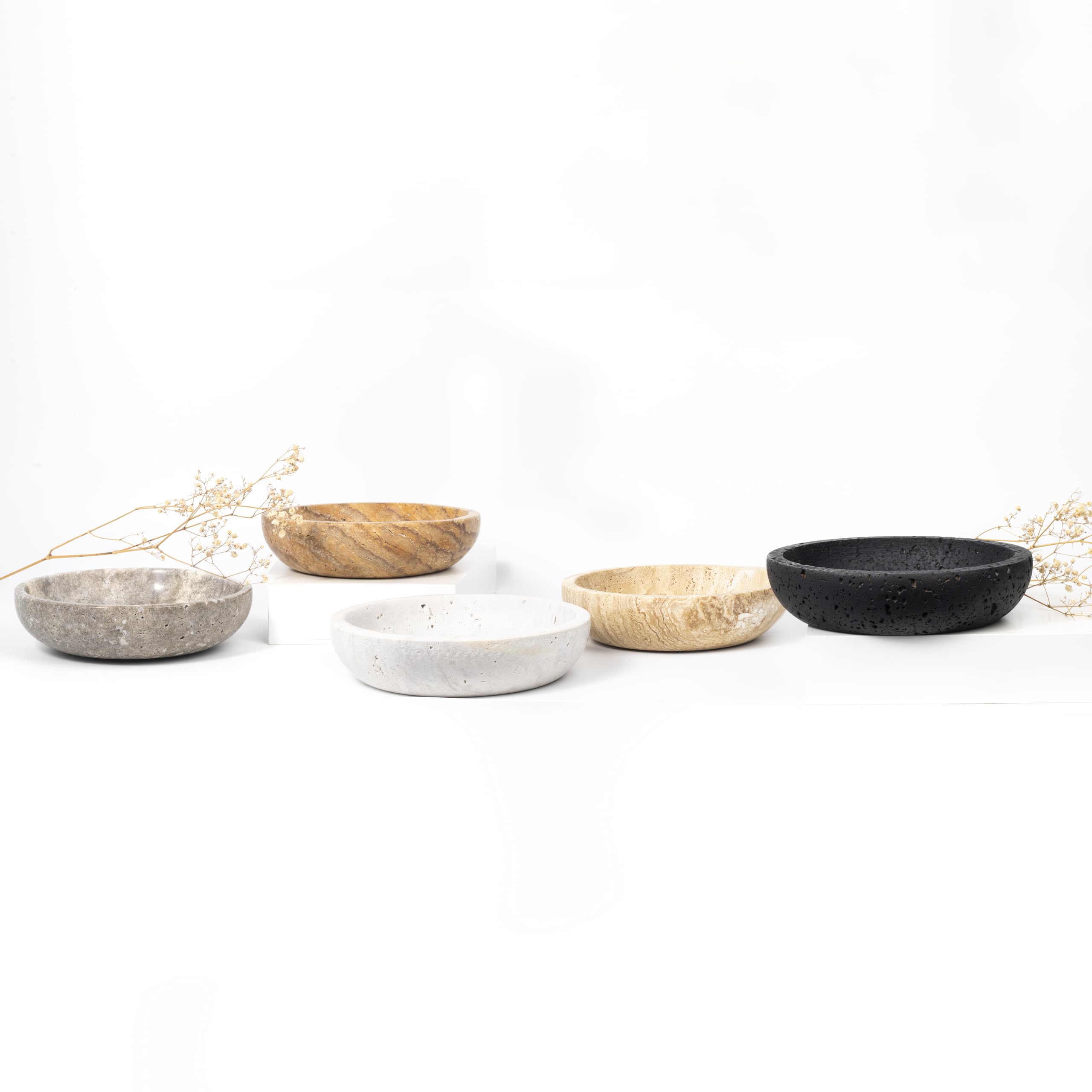 Shelf & Nook travertine black bowl complements kitchen countertops with durable, timeless contrast.