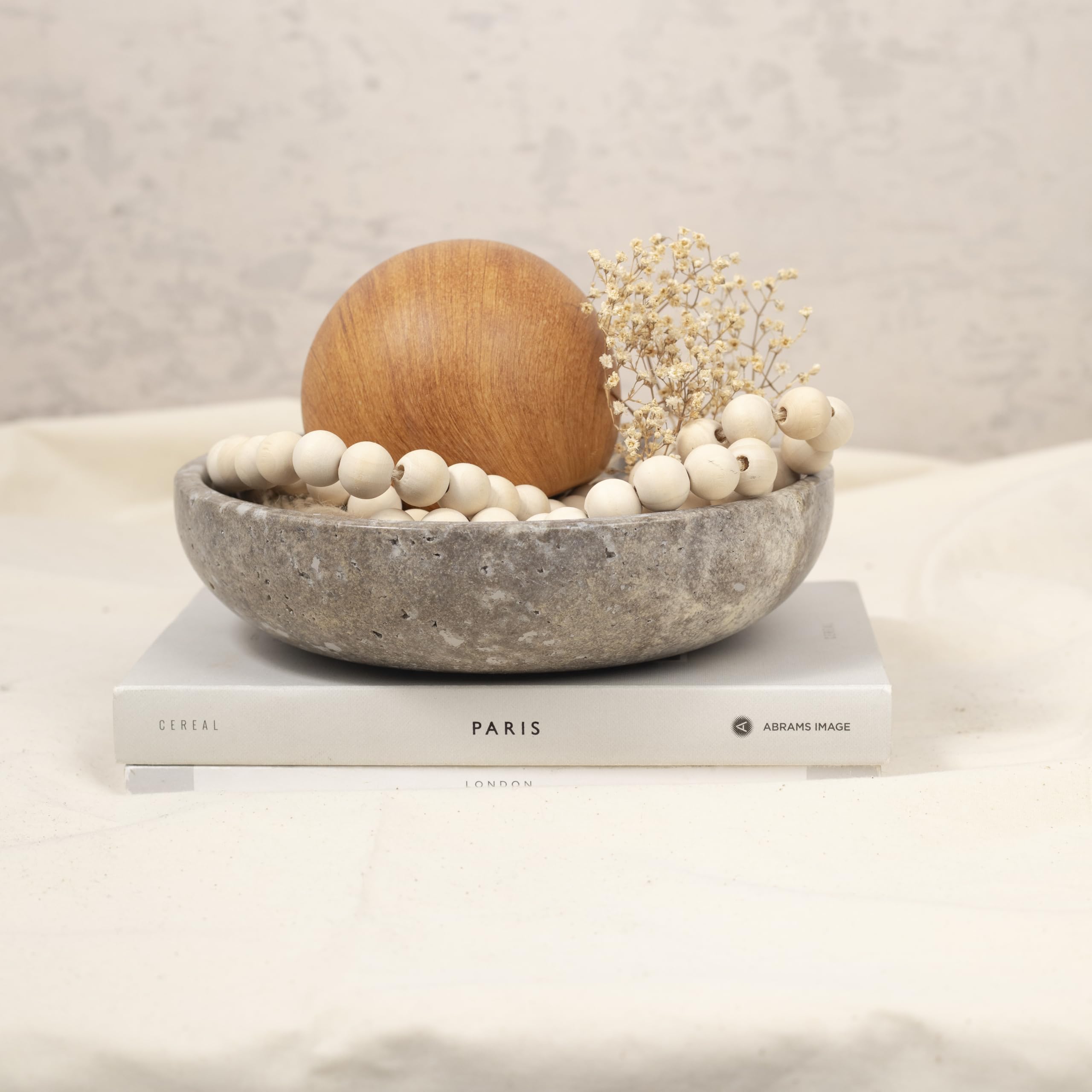 Shelf & Nook travertine bowl coffee table decor as a stylish centerpiece.