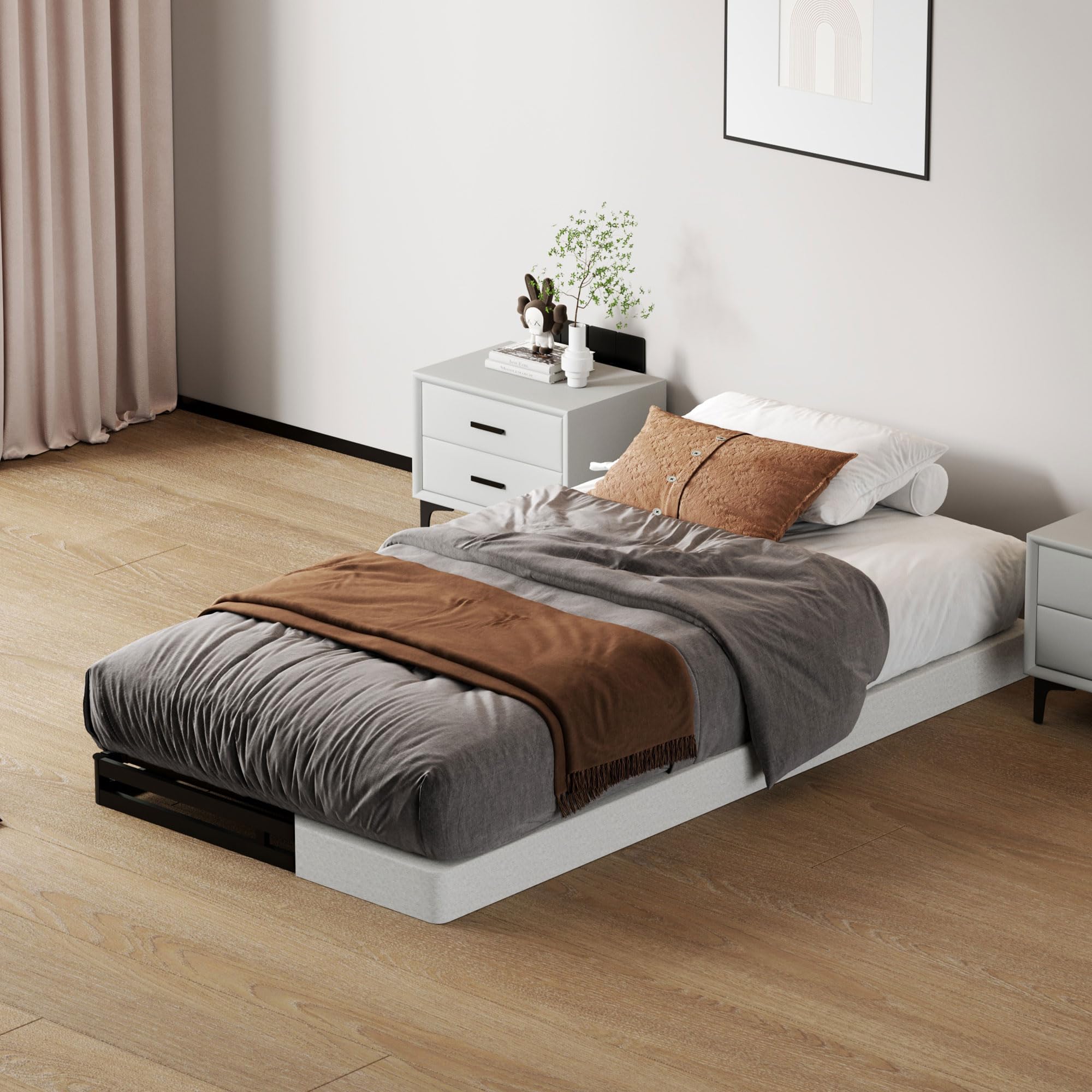 Twin bed base with reinforced frame fits under various mattresses and frames.