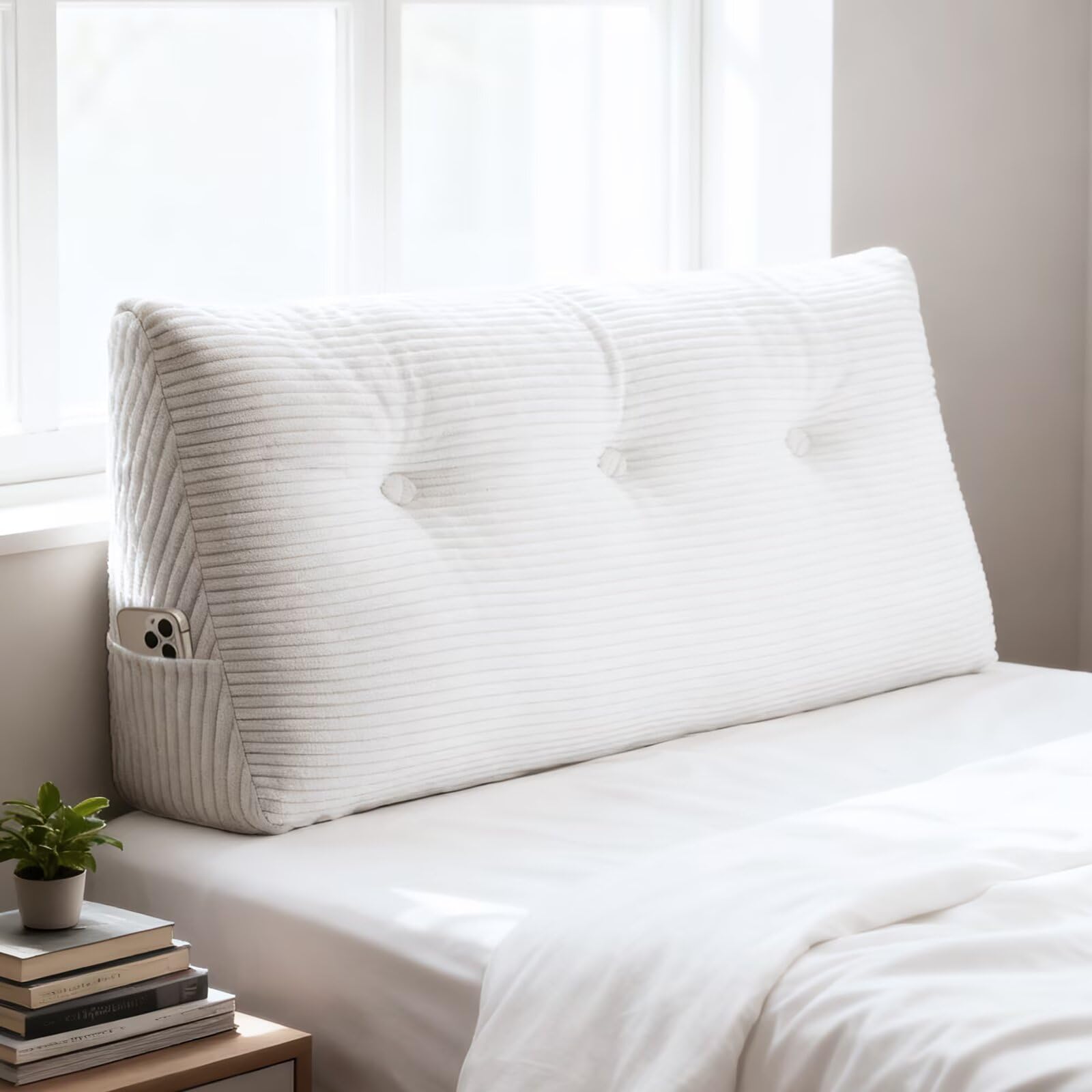 Shuyeon wedge headboard pillow on twin bed offering back support.
