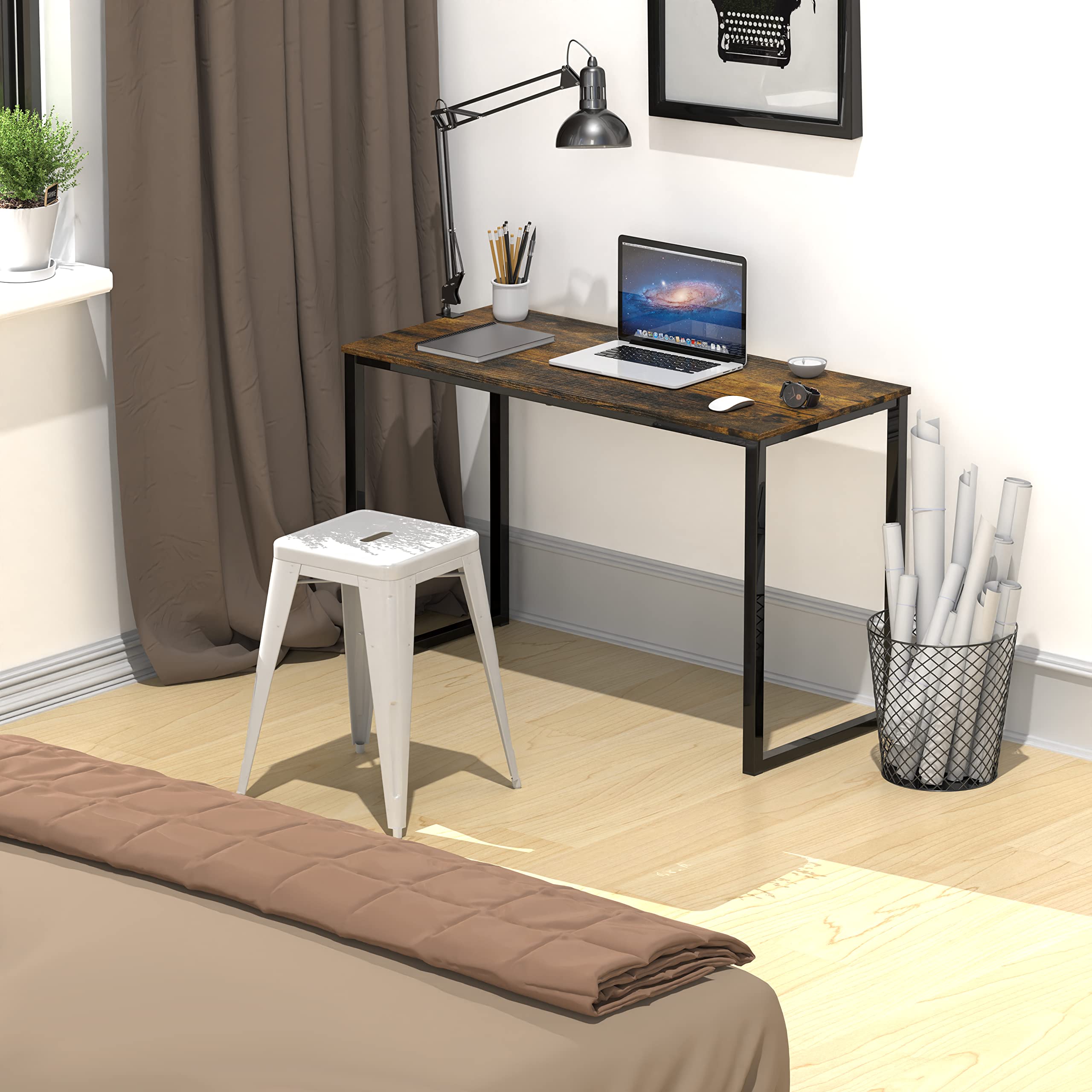 Dorm room setup with SHW Mission desk and laptop