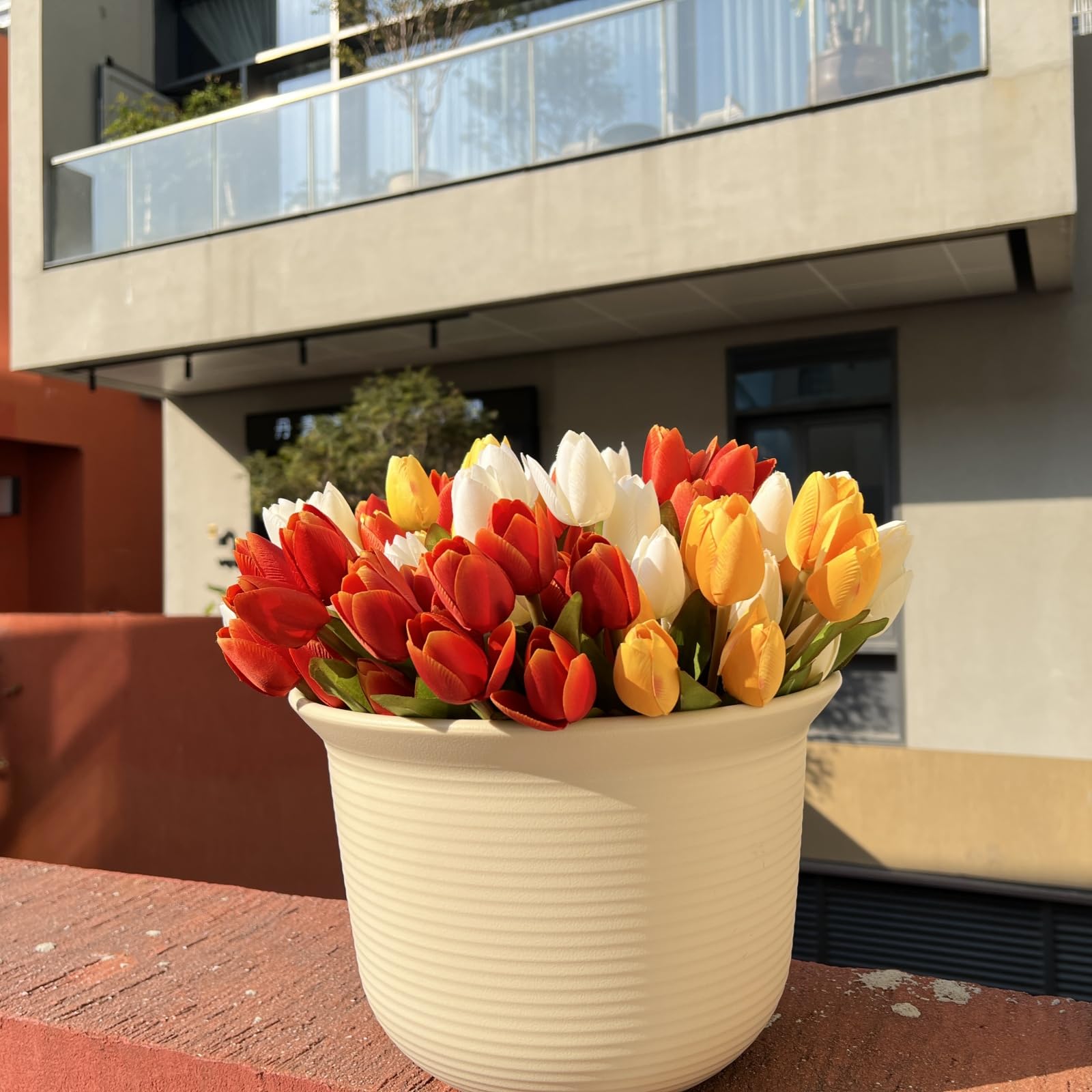 Shyshining indoor decor with tulips on a shelf