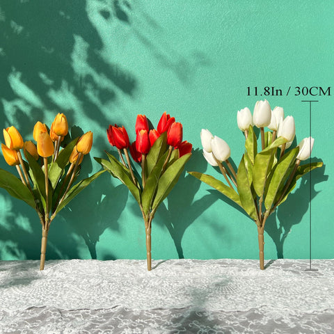 Shyshining orange tulips bundle brightening an outdoor doorway