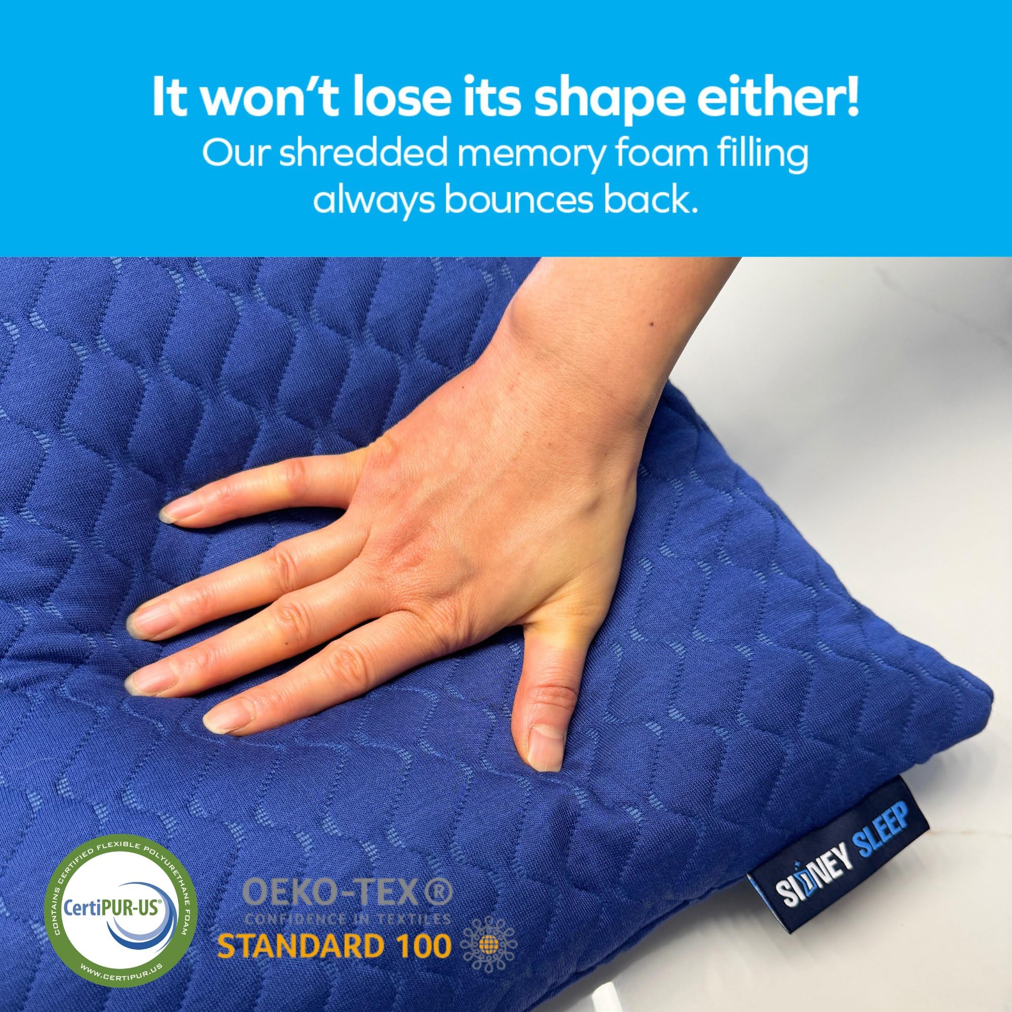 Sidney Sleep queen pillows on a bed designed for restful side and back sleep.