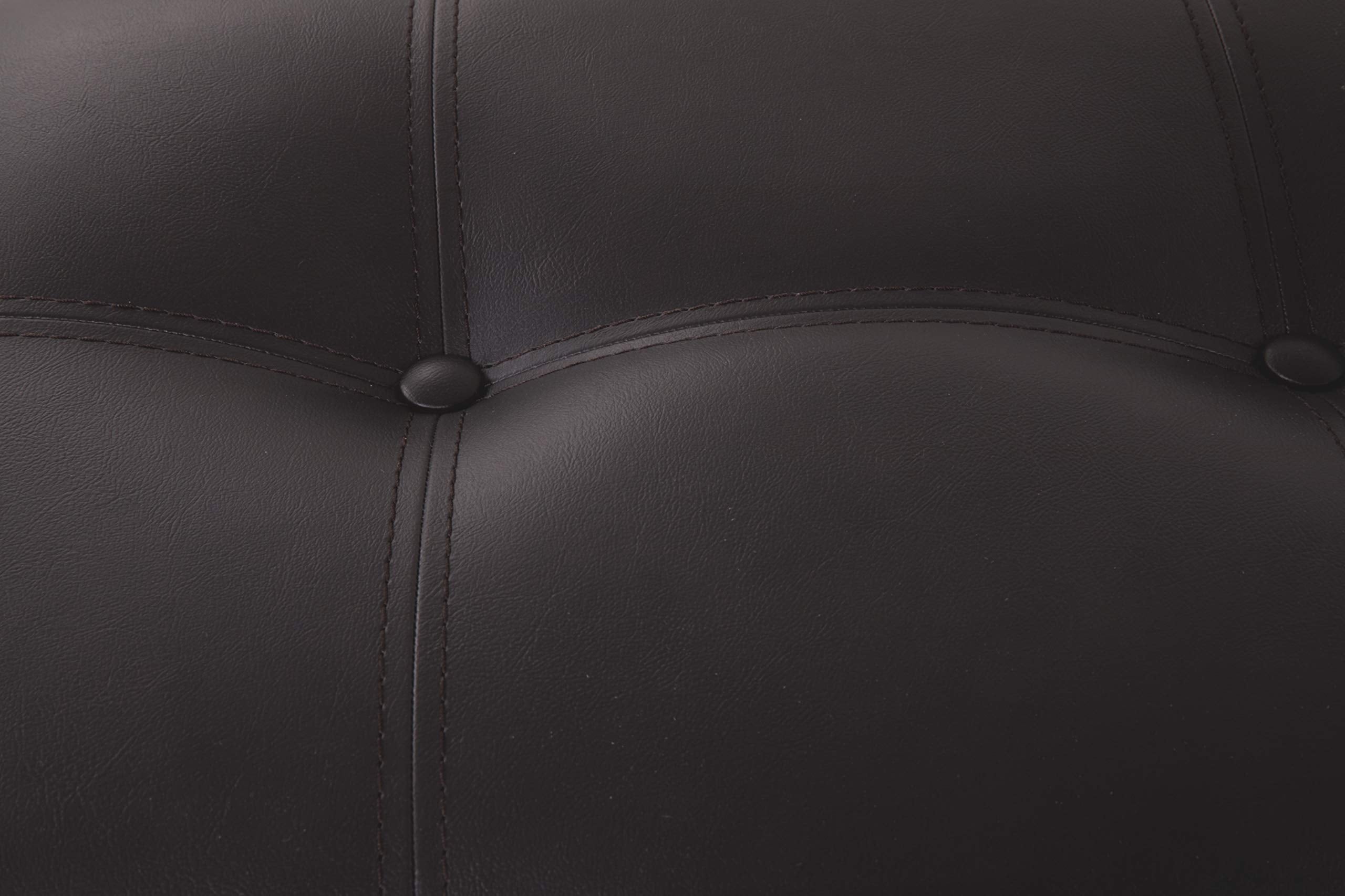 Signature Design by Ashley Haddigan faux leather upholstery combines durability with easy care.