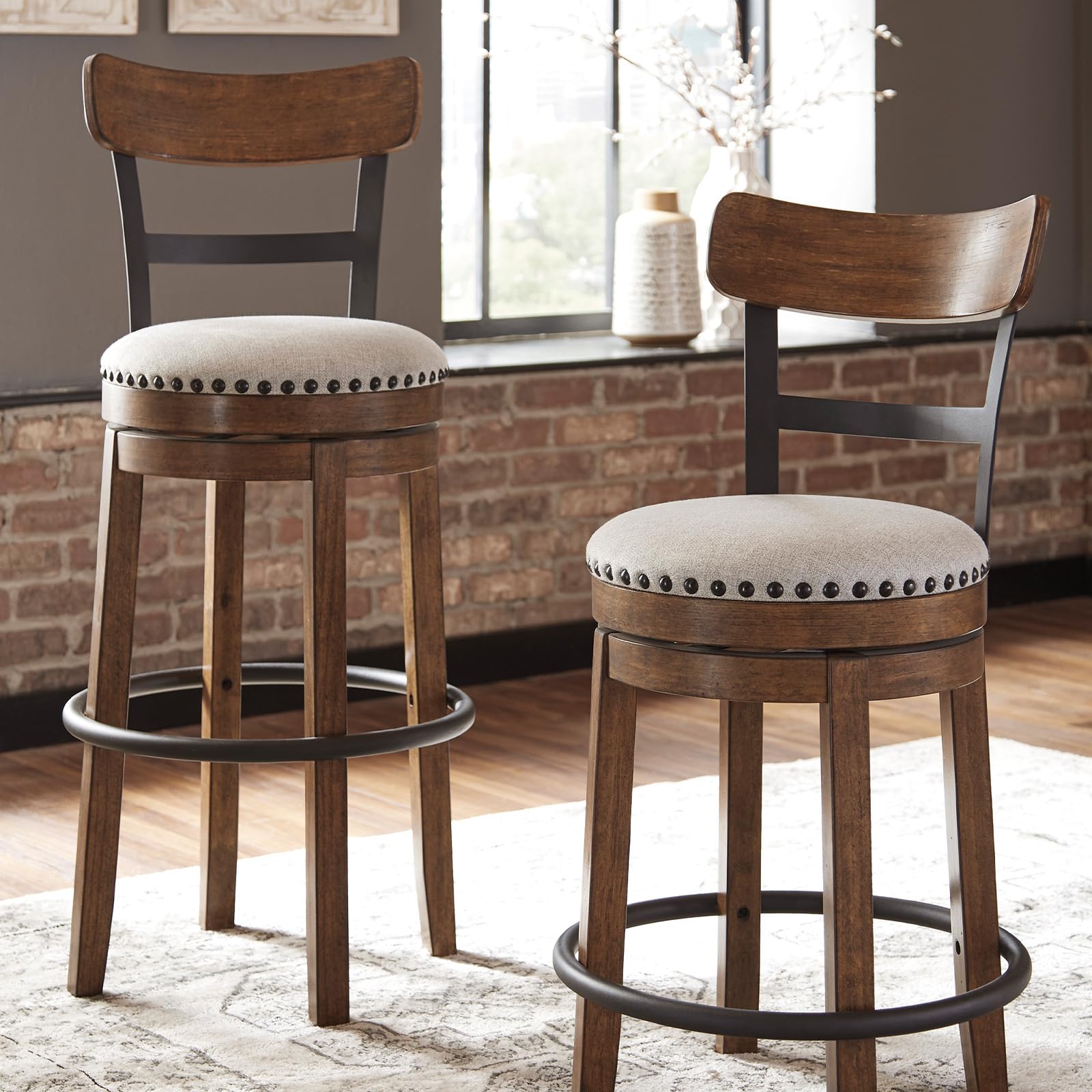 Signature Design by Ashley Valebeck nailhead trim adds vintage charm and style