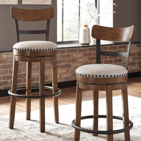 Signature Design by Ashley Valebeck nailhead trim adds vintage charm and style
