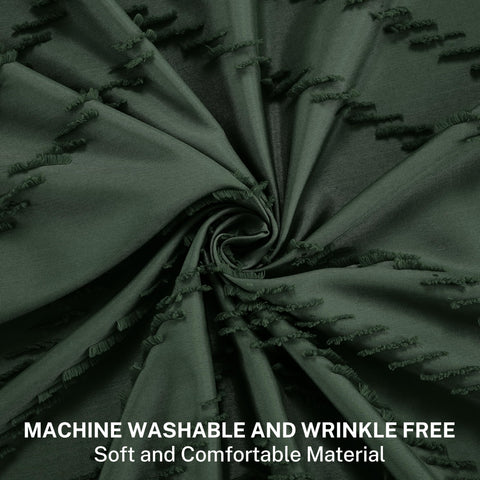 Siiluminisoy emerald green curtain showcases tassel detail for elegant bathroom décor.