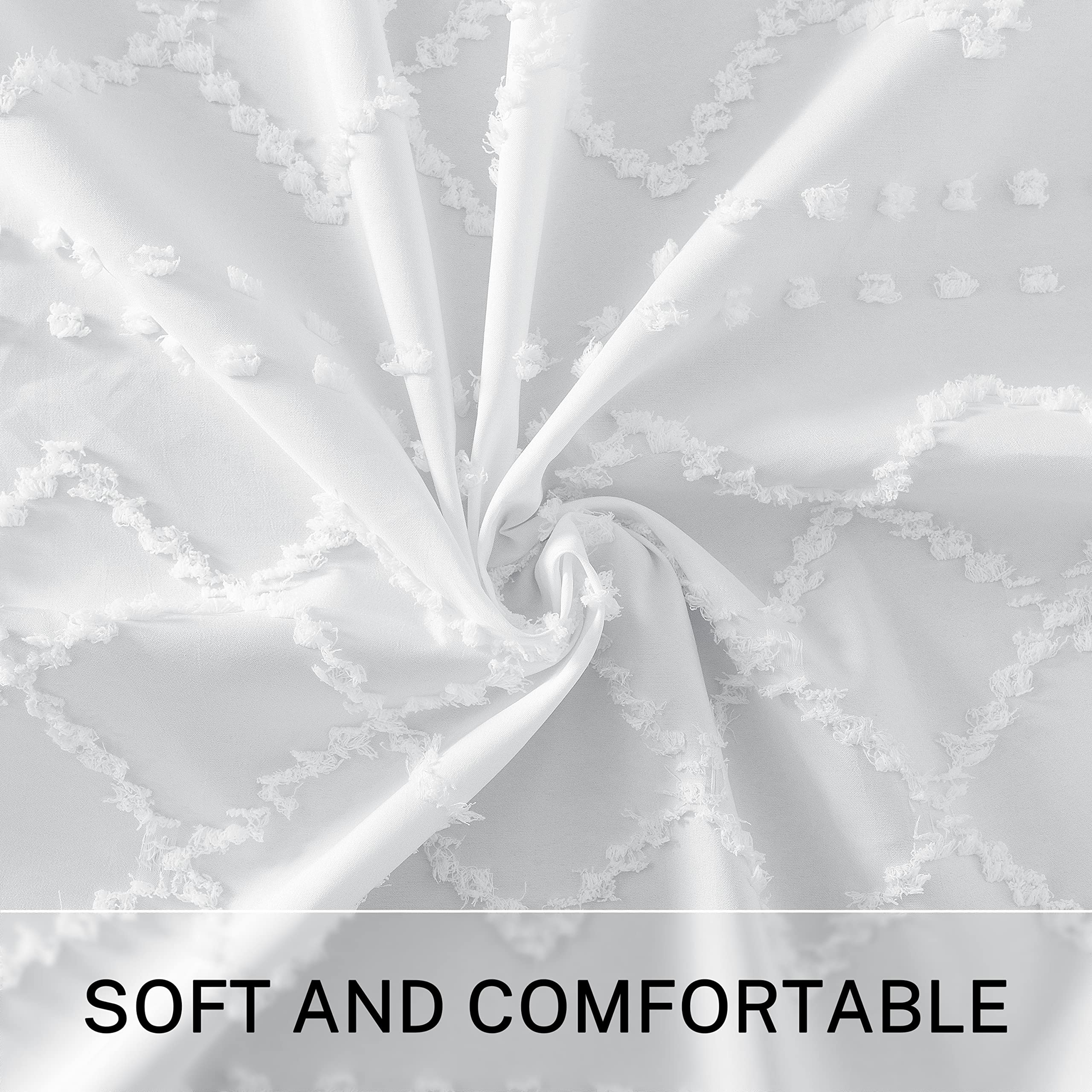 Siiluminisoy white tassel detail shower curtain adds boho charm.