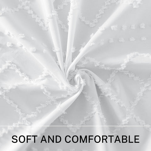 Siiluminisoy white tassel detail shower curtain adds boho charm.