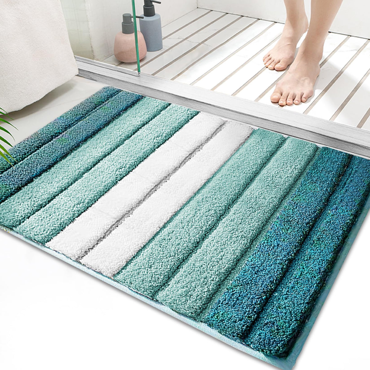 SiliPacks turquoise 20x32 rug with non-slip bottom for safe bathroom use.