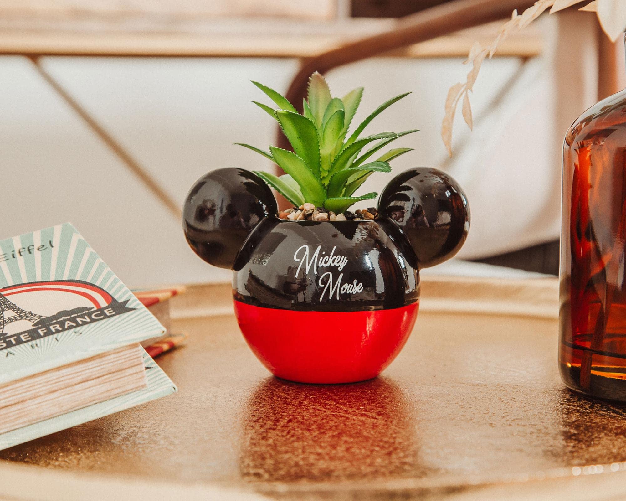 Silver Buffalo Mickey Mouse mini planter on shelf to show collectible charm