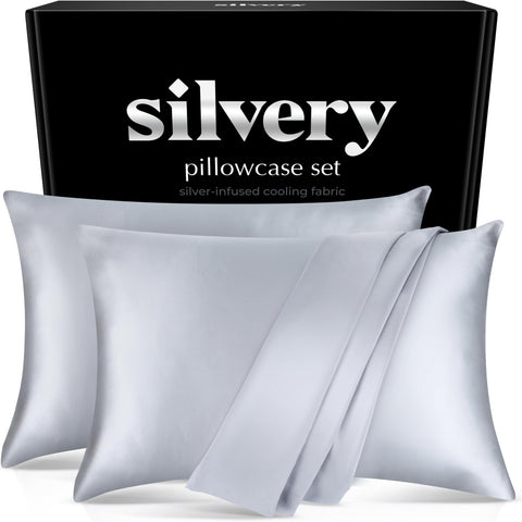 Silvery silver-infused pillowcase set on bed for cooler sleep