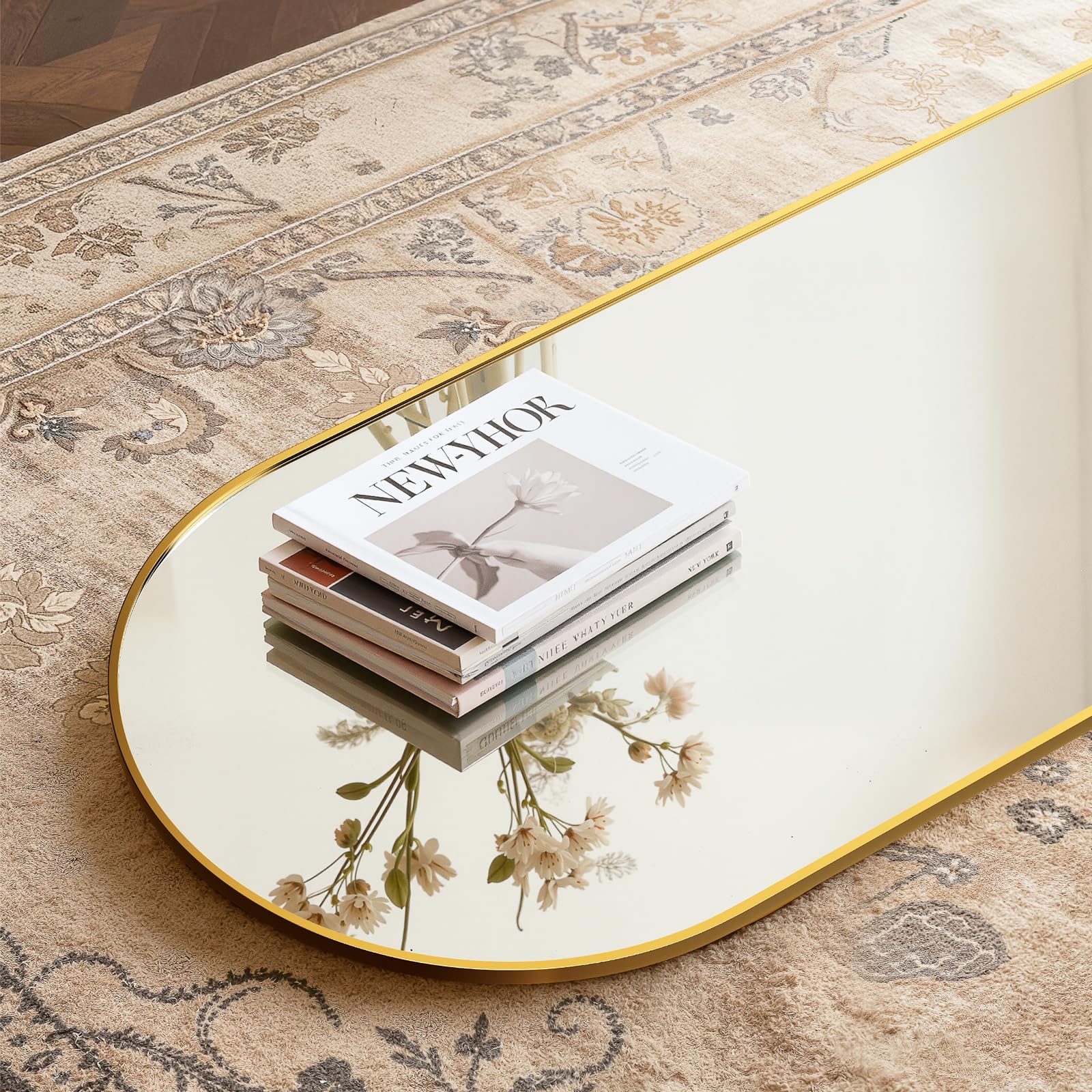 Simple Deluxe gold floor mirror in a bedroom setting enhances light and space