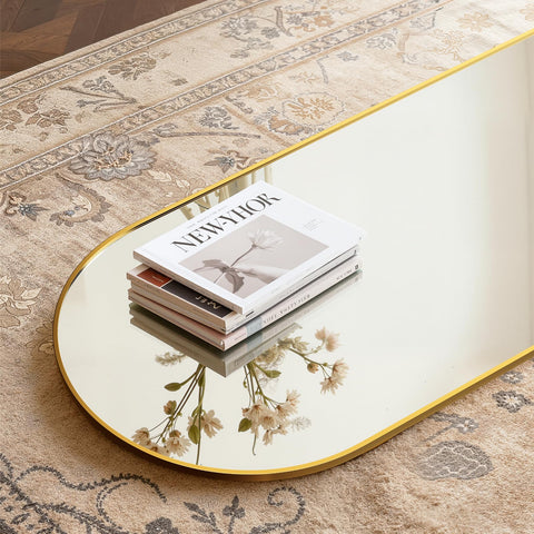 Simple Deluxe gold floor mirror in a bedroom setting enhances light and space