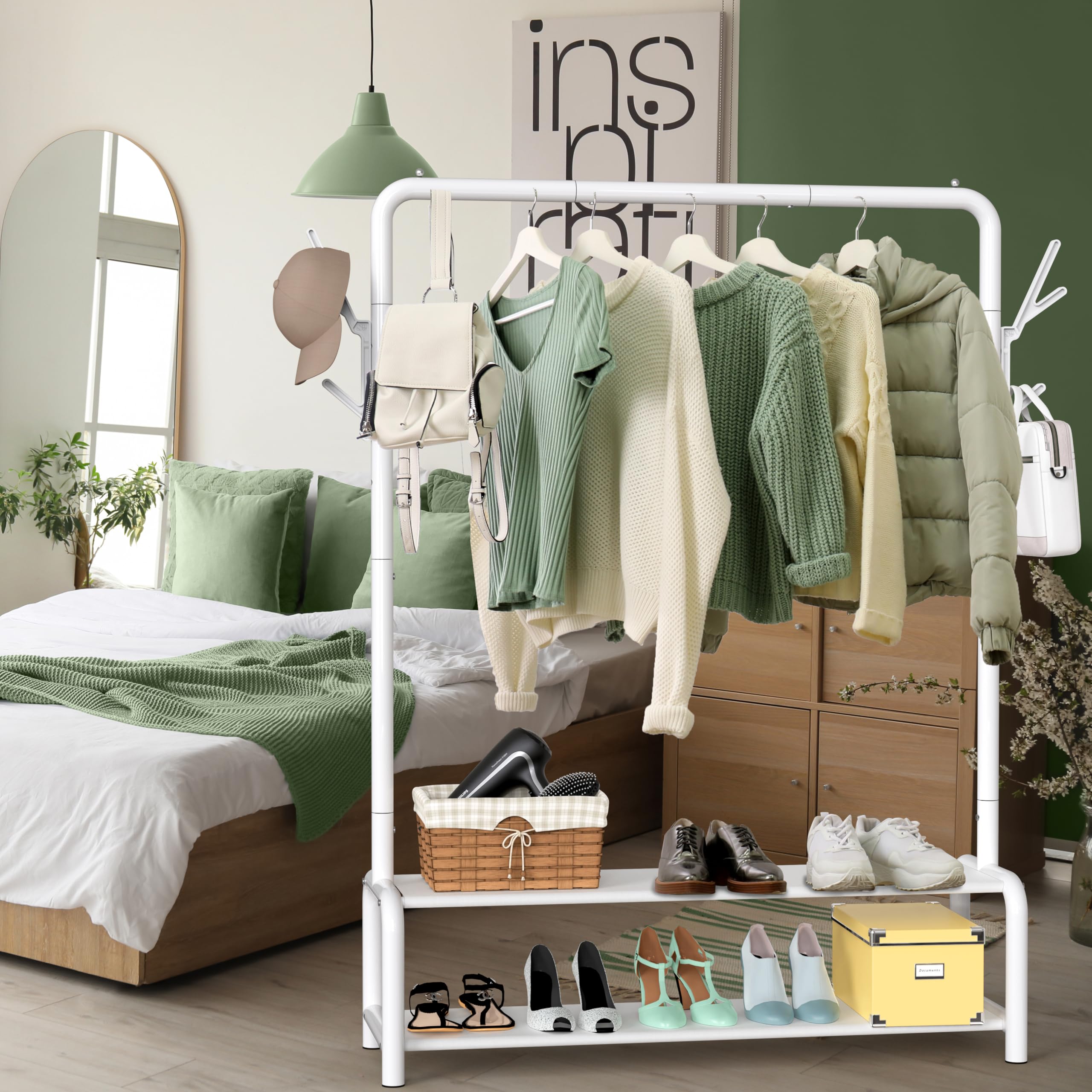 Simple Houseware 52-inch rack shows built-in rod stoppers to prevent hangers from slipping.
