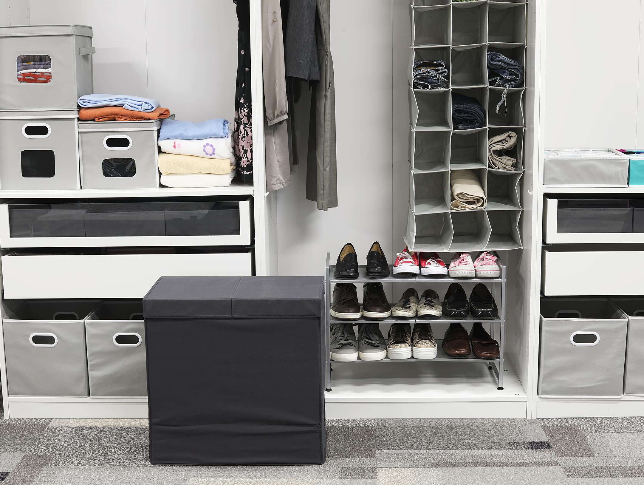 Simple Houseware portable hamper being moved between rooms.