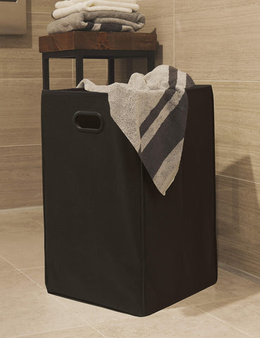 Simple Houseware black hamper with side cutout handles for easy transport.