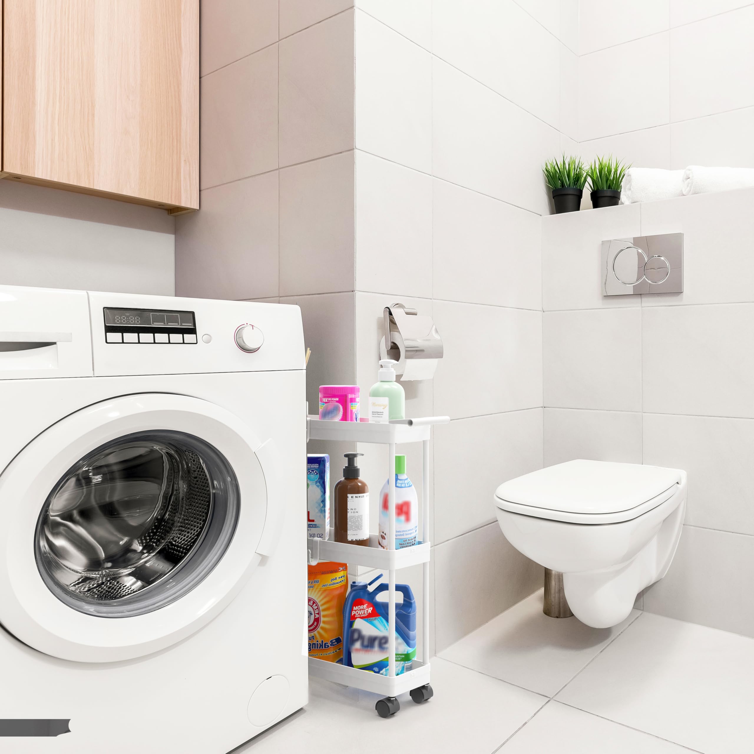 Simple Houseware slim cart between washer and dryer for compact laundry storage.