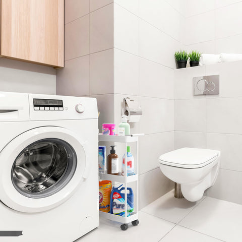 Simple Houseware slim cart between washer and dryer for compact laundry storage.
