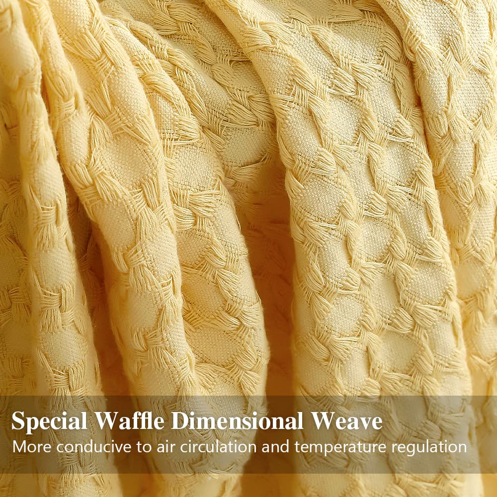 Simple&Opulence throw blanket draped on bed highlighting lightweight comfort.