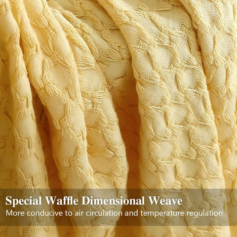 Simple&Opulence throw blanket draped on bed highlighting lightweight comfort.