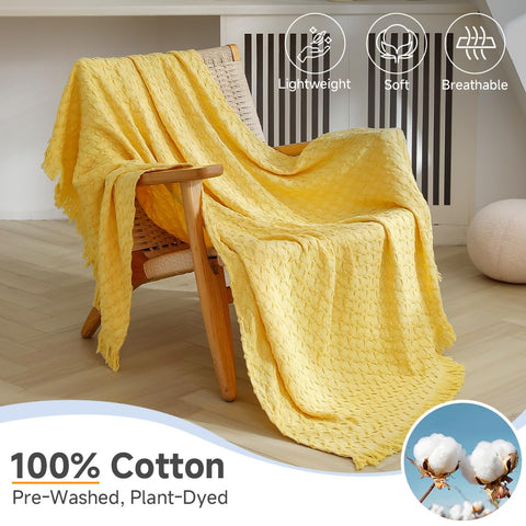 Simple&Opulence throw blanket on couch showing warm, inviting color.