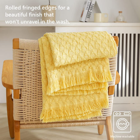 Simple&Opulence throw blanket in light yellow shade for bright room decor.